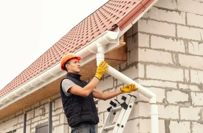Pose et remplacement de gouttières à Volon
